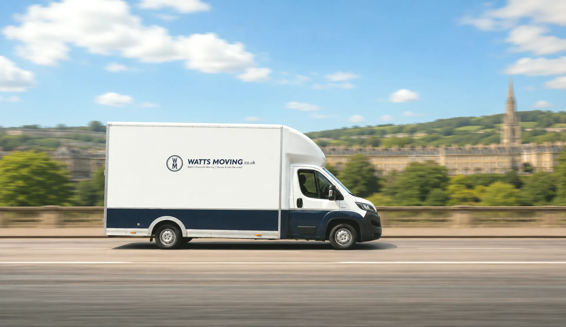 A Watts Moving removal van crossing a bridge over the river in Bath